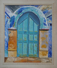 Load image into Gallery viewer, Arched aqua door in building.
